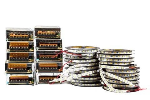 Modules of adapters with reel with ribbons of LED lamps Stock Photos