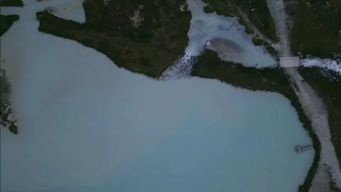 Moiry Glacier Sunrise Top Down Lateral Over Final Lake Stock Footage 323377837