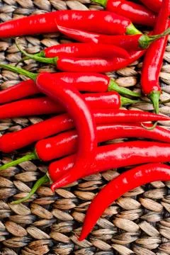 Moist Peppers on a Patterned Background Stock Photos