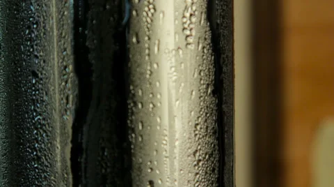 Moisture trickling down a cold beer pump Stock Footage 35192988