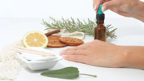 Moisturize hand with oil lateral Video stock 117429934
