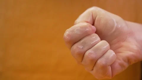 Moisturizing cream applied to the fingertips to protect the dry skin of the Stock Footage 263744630