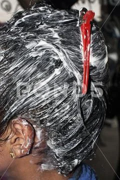 Moisturizing hair care application Hydration head close up Stock Photos