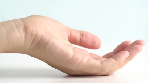 Moisturizing lotion pouring into open hand. Skin care concept Stock Footage 250552730