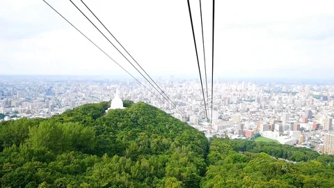 Moiwa Ropeway is a skyscraper Vídeos de archivo 94763370