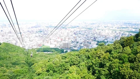 Moiwa Ropeway is a skyscraper Vídeos de archivo 94763476