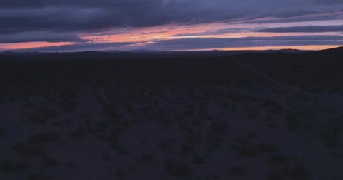 Mojave Desert Sunset Pull Back on Dark Evening Stock Footage 251832673