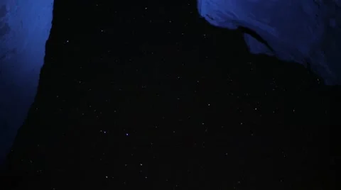 Mojave Red Rocks salt mine cave night time star burst sky meteor  timelapse Stock Footage 50521556