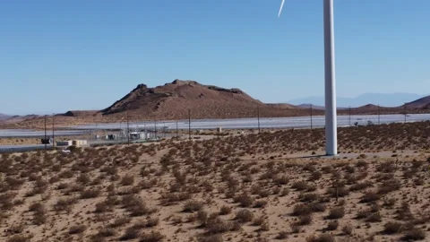 Mojave Wind Farm angle on access door and ladder at base of turbine DJI 4K Video stock 228880636
