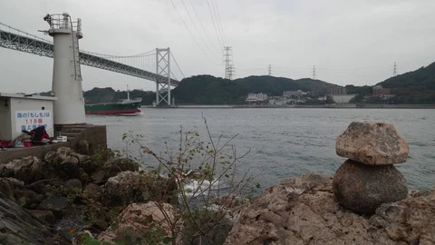 MOJIKO - OCT 26, 2018: Ship Sails by Kanmon Bridge Vídeos de archivo 97309675