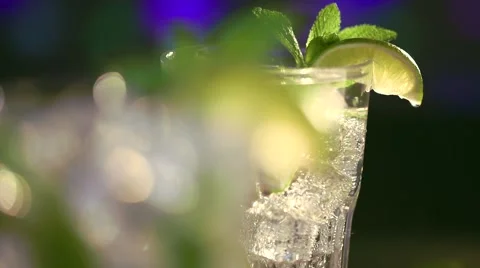 Mojito cocktail on a table in summer bar, party. Video stock 67357987