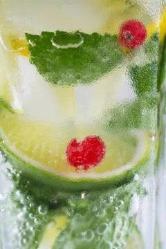 Mojito drink with lime, closeup . Macro concept of lemon , lime, mint  mojito Stock Photos