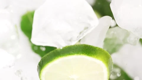 Mojito ingrediences flying up, lime, mint, ices and water. Drink concept Stock Footage 310545575