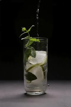 Mojito splash studio on black background Stock Photos