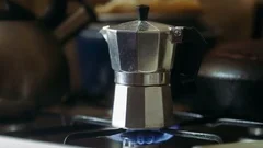 Metal Coffee Maker On A Camping Gas Stove. by Stocksy Contributor