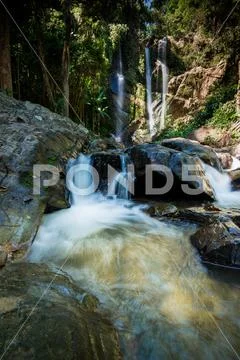 Mokfa Waterfall or Blue Waterfall in Chiang Mai, North of Thailand. Stock Photos