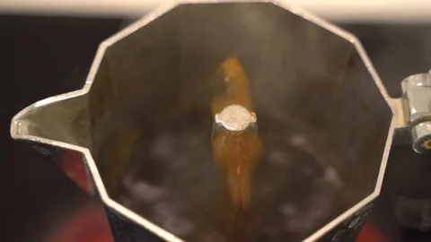 Mokka pot brewing hot black coffee Stock Footage 108984341