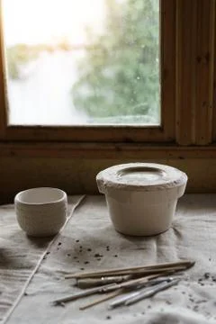 Mold for casting clay products with a mixture inside. Photos