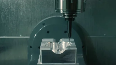 Mold machine drills and sprays water on mold as it's made in manufacturing plant Video stock 130668638