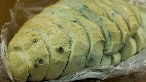 Molded bread on the kitchen table Video stock 104622477