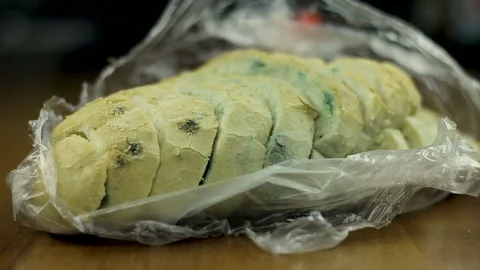 Molded bread on the kitchen table Video stock 104624122