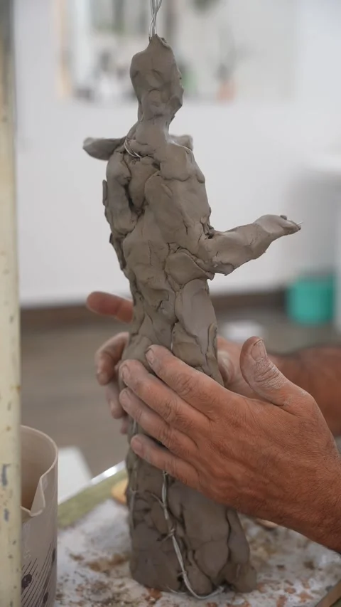 Molding a Clay Figure Stock Footage 315786760
