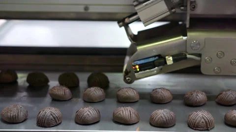 The molding machine produces chocolates. Stock Footage 242194257