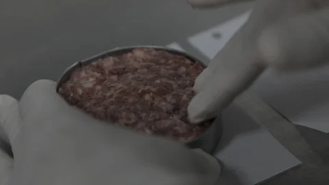 Molding Raw Blend Of Meat for a Burger Stock Footage 128756641