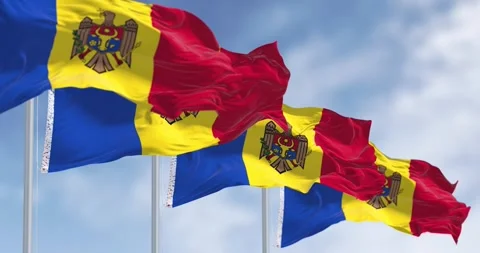 Moldova national flags waving in the wind on a clear day Stock Footage 274347782