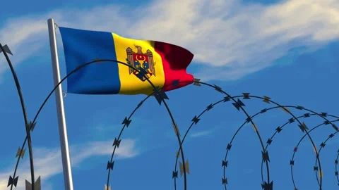 Moldovan flag waving behind razor wire Stock Footage 171715512