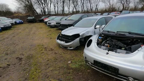 Møldrup, Denmark, January, 2022: Car junkyard where you can buy spare parts Stock Footage 169366489