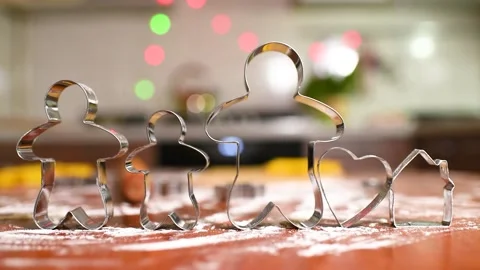 Molds for baking gingerbread in the shape of men, hearts and houses close-up on Stock Footage 142281371
