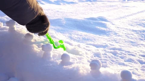 Molds for molded snow figures of ducks and dragons, winter Stock Footage 325668594