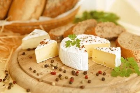 Moldy brie cheese with bread Stock Photos