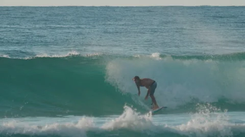 MOLE BEACH, FLORIANOPOLIS, BRAZIL - 25 FEBRUARY 2026: Surfer with limited Video stock 330198203
