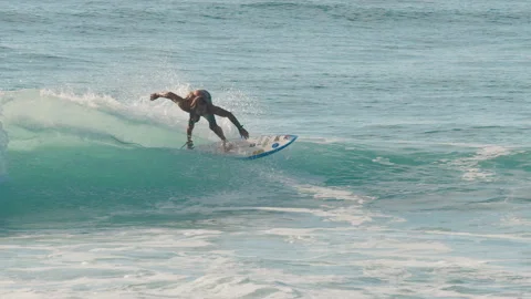 MOLE BEACH, FLORIANOPOLIS, BRAZIL - 25 FEBRUARY 2026: Surfer with limited Video stock 330199382
