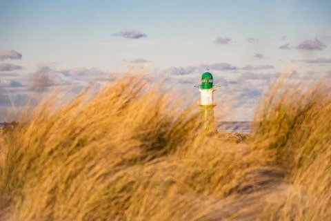 The Mole in Warnemuende with dune grass Stock Photos