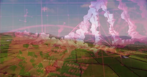 Molecular helix grid overlay floating across green farmland patchwork, showing Stock Footage 307443964