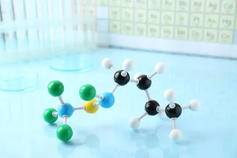 Molecular model on light blue glossy surface Stockfoto's