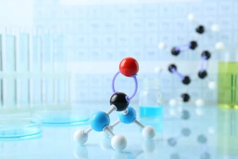 Molecular model on light surface against blurred background Stock Photos