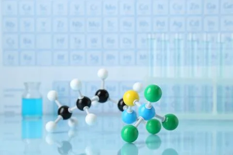 Molecular model on light surface against blurred background Stock Photos