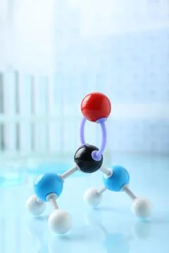 Molecular model on light surface against blurred background Stock Photos