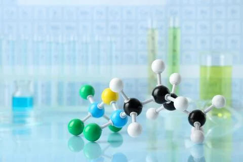 Molecular model on light surface against blurred background 写真素材
