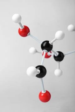 Molecule of glucose on light grey background, closeup. Chemical model Stock Photos