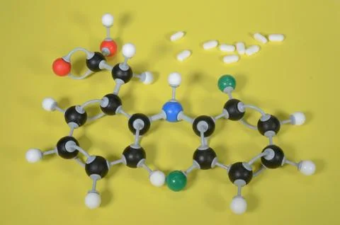 Molecule model of Diclofenac, the active ingredient in many pain killers. Stock Photos