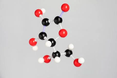 Molecule of vitamin C on light grey background. Chemical model 写真素材