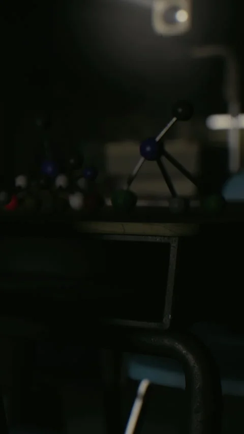 Molecules on a table in a dark room during a science experiment at night Stock Footage 341239660
