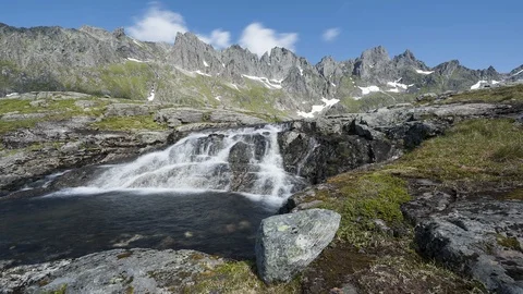 Molladalstindane with waterfall Stock Footage 88242768
