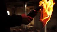 Molotov Cocktail Flame Danger Man Shadow Rebel Terrorist Hd Stock Footage