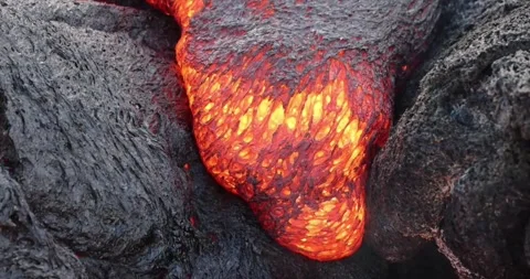 Molten lava close-up motion magma flow nature mountain volcano footage Stock Footage 336579905